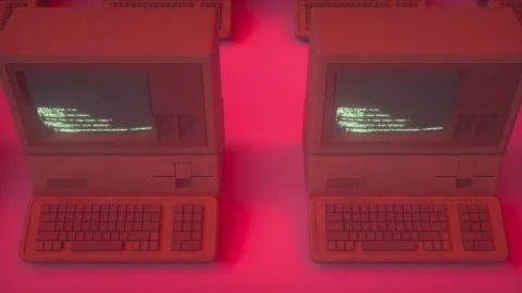 Retro Computers Running Code in Seamless Loop With Intense Red Lighting Stock Footage 308745741