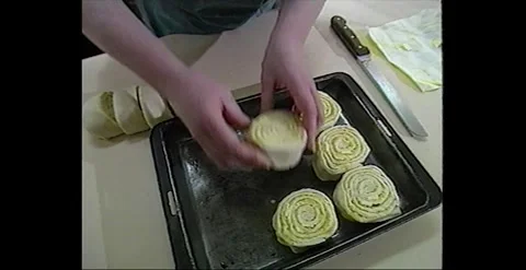 Retro Cooking: Bakery Preparing Delicious Sticky Buns (1990) Stock Footage 274534827