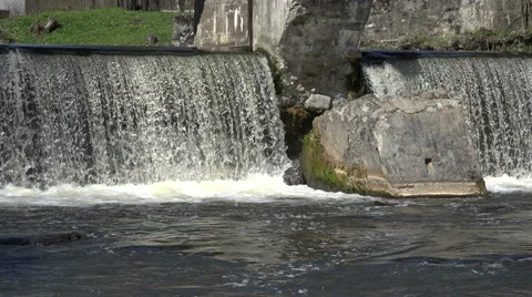 Retro dam over river waterfall water flowing. 4K Stock Footage 51484894