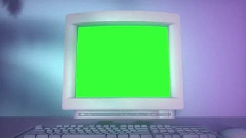 Retro Desktop Computer With Green Screen in Neon Studio Lighting Stock Footage 340922817