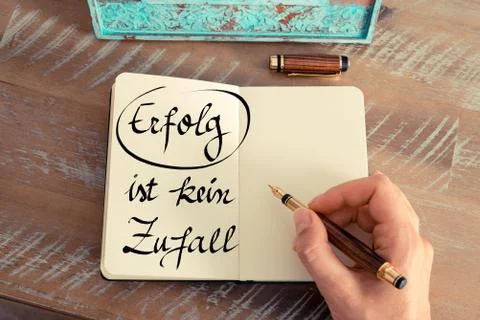 Retro effect and toned image of woman hand writing a note on a notebook. Hand Stock Photos