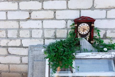 Retro elements on the background of a brick wall of an abandoned building. Th Stock Photos