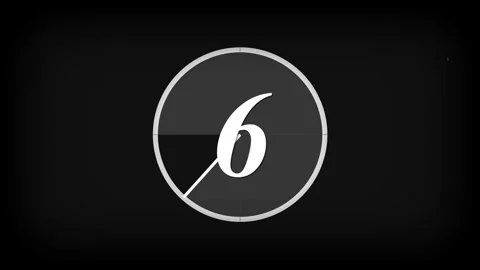 Retro film leader countdown featuring a stylized white number Vídeos de archivo 334958546