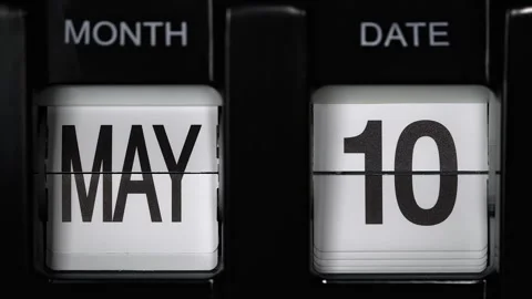 Retro flip calendar with date change from tenth of May to eleventh May. close up Stock Footage 267051916