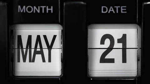 Retro flip calendar date change twenty first May to twenty-second May. close up. Stock Footage 267376763