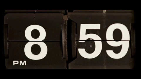 Retro flip clock changes from eight to nine pm Video stock 329667494