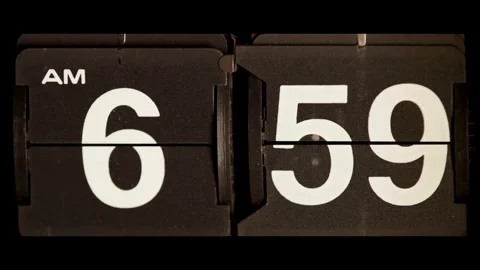 Retro flip clock changes time to seven o clock Stock Footage 329673810