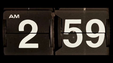 Retro flip clock changes from two fifty nine am Stock Footage 329673942