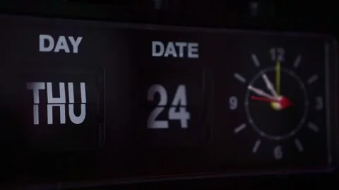 Retro flip clock with day and date display, analog hands ticking, Stock Footage 345871128