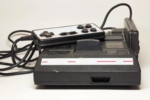 Retro game console. 8-bit television game system. Two joypads with cross of.. Stock Photos