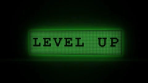 Retro Gaming Level Up Message on a Glowing Green LED Pixel Screen Stock Footage 336619399