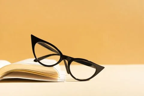 Retro glasses book Stock Photos