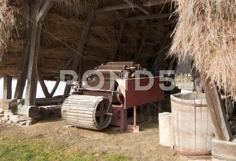 Retro Grain Thrasher And Some Specific Agriculture Tools Stock Photos