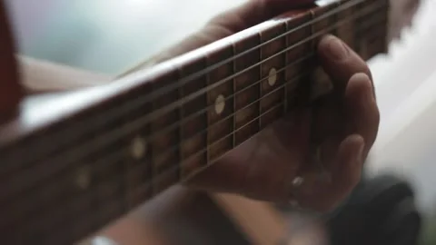 Retro guitar, man playing old acoustic guitar, close-up of playing guitar Stock Footage 147437536
