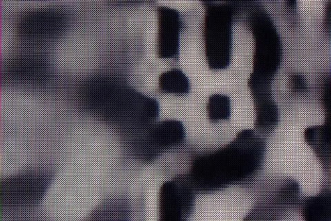 Retro halftone pattern texture consists of chaotic raster dots on a gray ba.. Stock Photos
