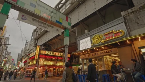 Retro Import Wear Store and Outdoor Snack Bar Beneath Pedestrian Overpass — Stock Footage 336450554