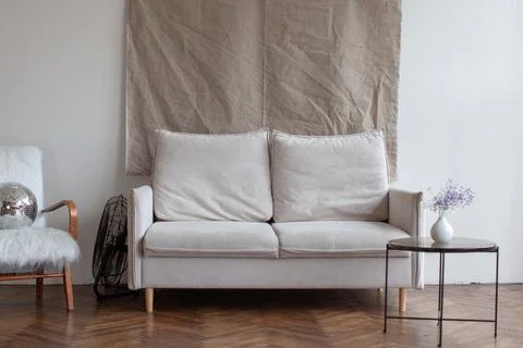 Retro interior with white sofa. Stock Photos