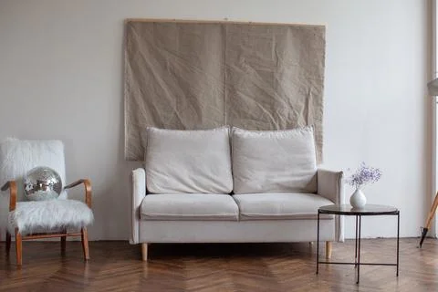 Retro interior with white sofa. Stock Photos