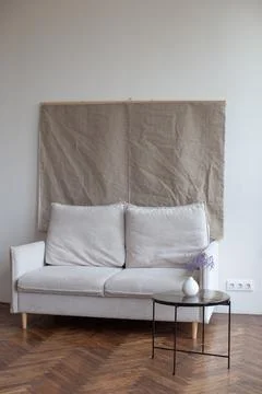 Retro interior with white sofa. Stock Photos