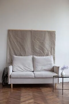 Retro interior with white sofa. Stock Photos