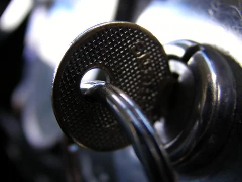 Retro key in ignition close up Stock Photos