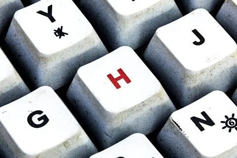 Retro Keyboard with H button in red color. H button keyboard in close up macr Stock Photos