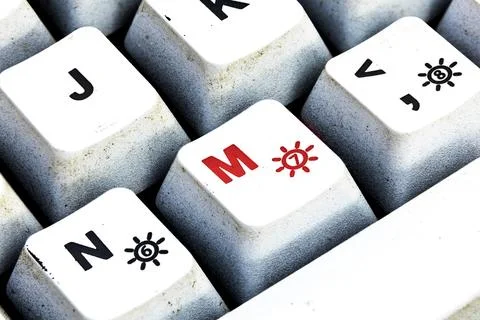 Retro Keyboard with M button in red color. M button keyboard in close up macr Stock Photos