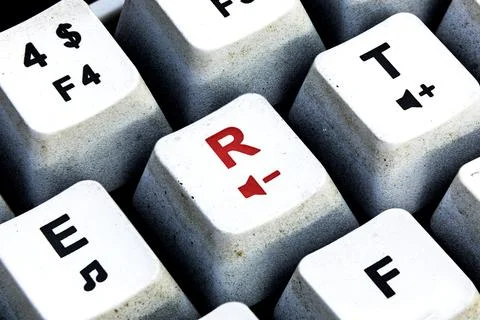 Retro Keyboard with R button in red color. R button keyboard in close up macr Stock Photos