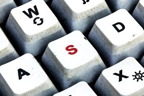 Retro Keyboard with S button in red color. S button keyboard in close up macr Stock Photos