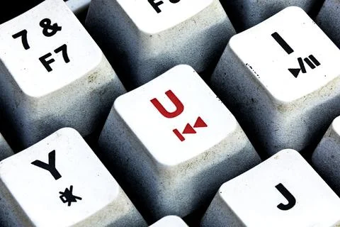 Retro Keyboard with U button in red color. U button keyboard in close up macr Stock Photos