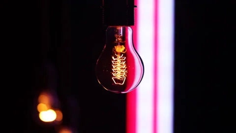 Retro lamp hanging on black background with led stripes. Stock Footage 146008455