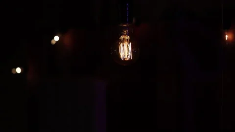 Retro lamp hanging on black background. Stock Footage 146009033