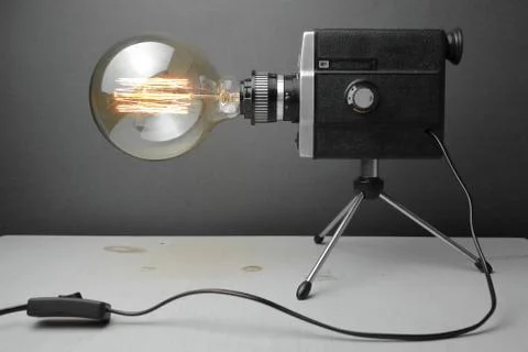 Retro lamp from an old camera with an Edison lamp. Concept is a good idea. Stock Photos