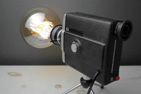 Retro lamp from an old camera with an Edison lamp. Concept is a good idea. Stock Photos