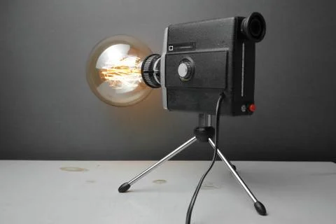 Retro lamp from an old camera with an Edison lamp. Concept is a good idea. Stock Photos