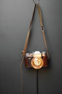 Retro lamp from an old camera with an Edison lamp. Concept is a good idea. Stock Photos