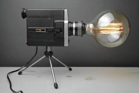 Retro lamp from an old camera with an Edison lamp. Concept is a good idea. Stock Photos