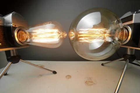 Retro lamp from an old camera with an Edison lamp. Concept is a good idea. Stock Photos