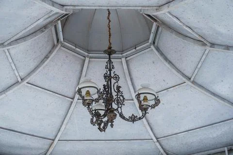Retro lantern lighting in a gazebo Stock Photos