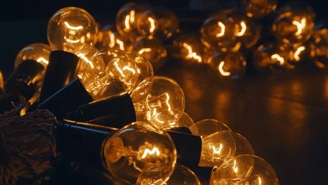 Retro light bulb filament close up.Illuminated. Old vintage light bulb Video stock 73014983
