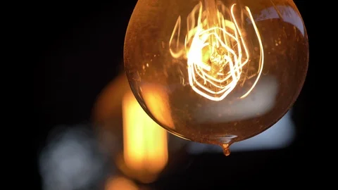 Retro lighting Lamp in loft style, bokeh style, night cafe Stock Footage 98582415
