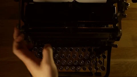 Retro look of old typewriter with hands tapping and sound Stock Footage 85438348