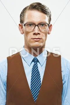 A retro looking man in a vest and shirt and tie Stock Photos