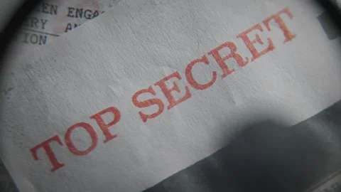Retro looking red stamp of Top Secret label on government report or document Видео 334044887
