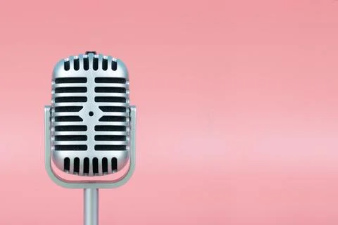 Retro microphone with copy space on pink background 스톡 사진