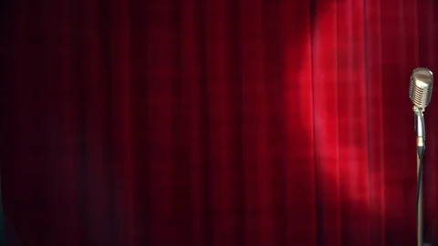Retro microphone over the red curtain background 스톡 동영상 104036688