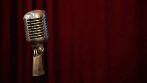Retro microphone with red curtain Stock Footage 90460554