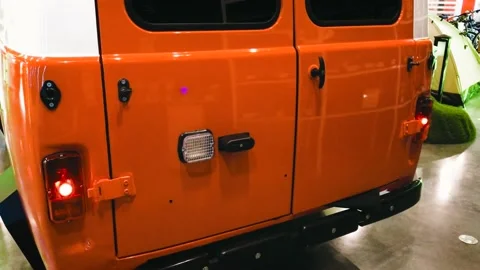 Retro minivan trunk rear door orange color 動画素材 210444986