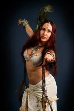 Retro model in old-fashioned wild clothing dancing Stock Photos