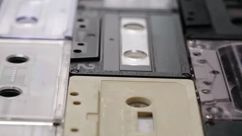 Retro music compact cassettes on a table Video stock 88914349